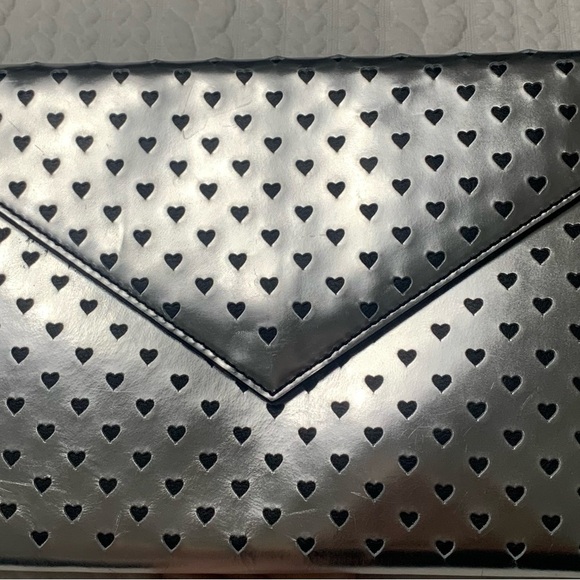 Adorable envelope style clutch handbag from JCrew
Silver metallic color - Picture 4 of 8